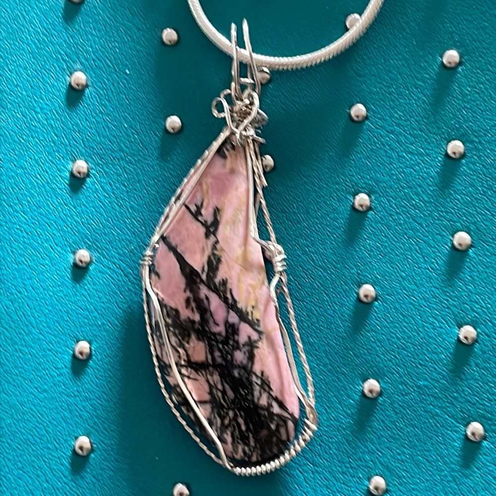 Rhodonite stone sterling wire-wrapped w/sterling silver Artist one of a kind.